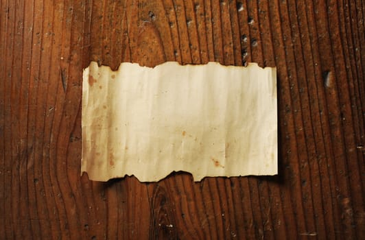 old paper on wooden background