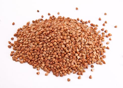 Crude buckwheat on a white isolated background