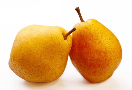 Two fresh ripe pears on isolated fone