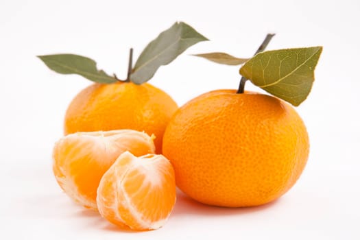 Fresh lobule of tangerine on isolated fone