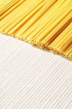uncooked spaghetti noodles . Italian pasta