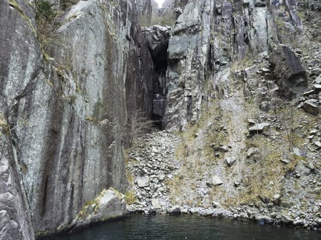 steep stony coast in norway with boulder