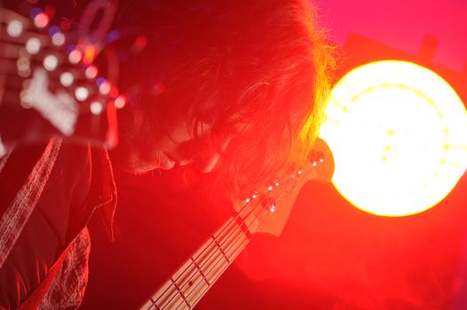 rock musicians playing at a live concert