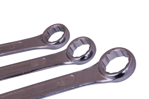 Chrome spanners on a white background.
