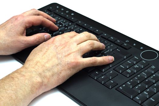 A computer operator at a keyboard Typing