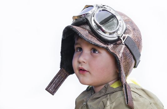 A little cute baby dreams of becoming a pilot. Pilot outfit, hat and glasses