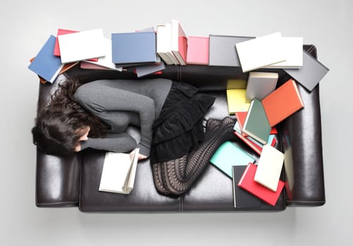 student fell asleep  while doing his homework