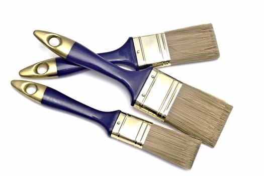 Paintbrushes closeup on white background 
