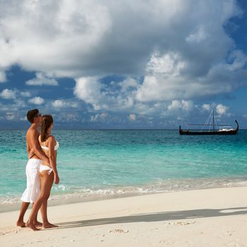 Couple on a tropical beach at Maldives