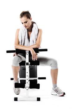 Young woman resting after exercising 