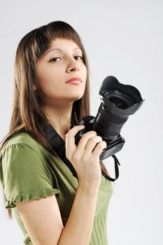 A young girl holds up a camera.
similar photographer pictures from my portfolio