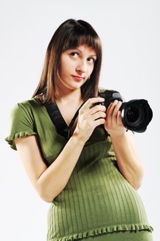 A young girl holds up a camera.
More photos from this series on my portfolio