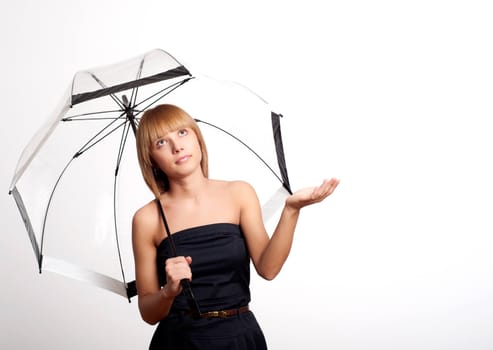 Young fashionable woman smile and holding umbrella