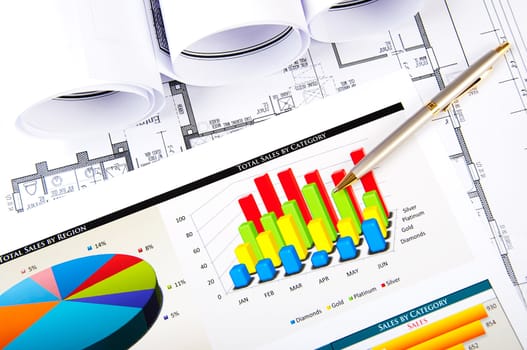 Drawings and charts of successful business, workplace of the businessman