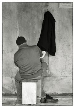 Muslim man washing his feet, hands and face before the prayer in the mosque, Istanbul, 