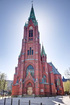 A picture of the church "johanneskirken" in Bergen city, Norway.  With the sun shining from behindBuilt between 1888 and 1894