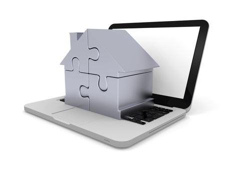 House symbol made of four silver puzzle pieces on laptop