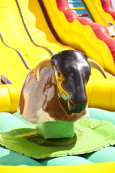 Bull riding on a funfair