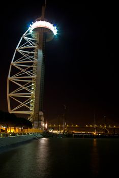 illuminated Torre Vasco da Gama in Lisbon at night