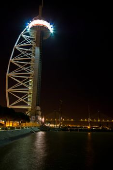 illuminated Torre Vasco da Gama in Lisbon at night