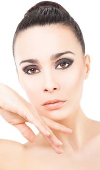 Close-up of beautiful female touching her face, beauty portrait