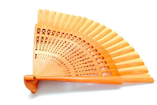 opened wooden fan over white background