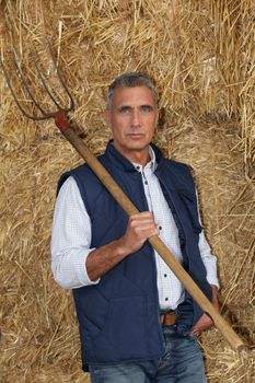 Farmer holding a pitchfork