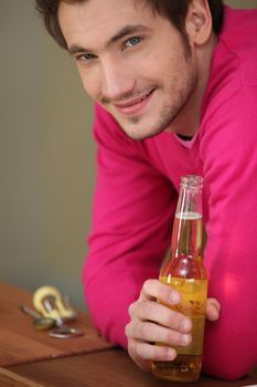 man drinking beer