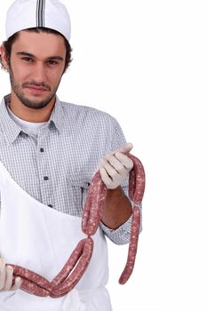 Butcher with sausages