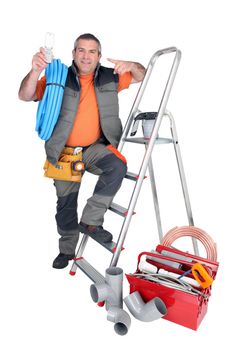 Handyman with a toolbox and cellphone