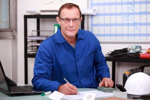 Warehouse worker taking inventory