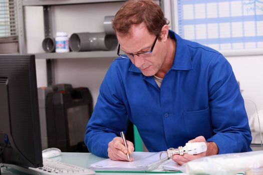 Builder working in the office