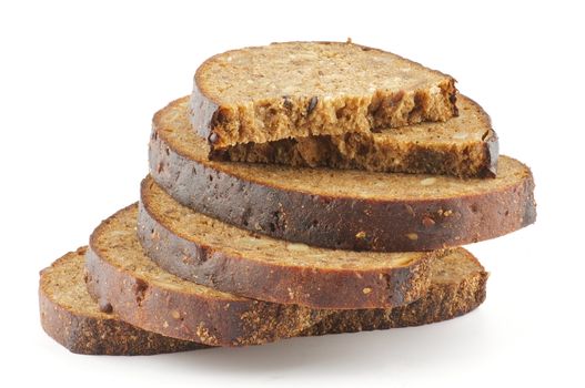 Slices of whole wheat brown bread isolated on white background