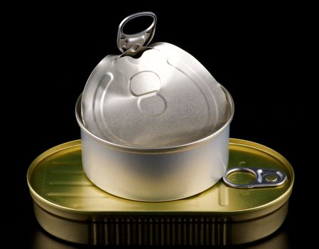 Stack of Canned Goods isolated on black background