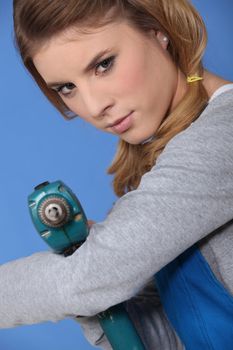 Woman with a drill