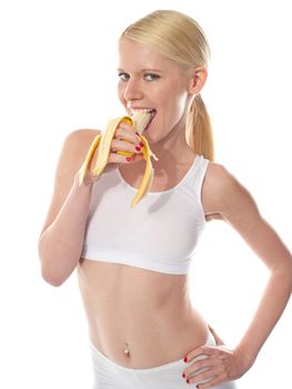 Wanna some? A starving sexy woman eating banana, half-peeled