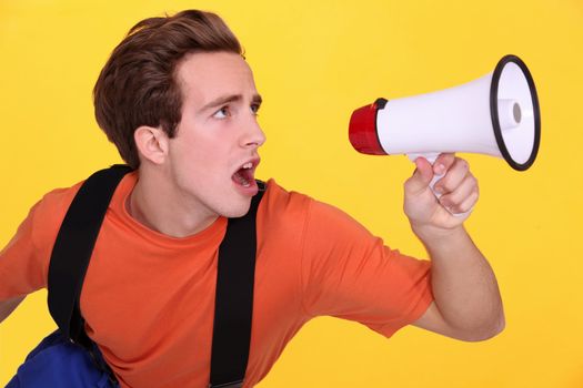 Man shouting into megaphone