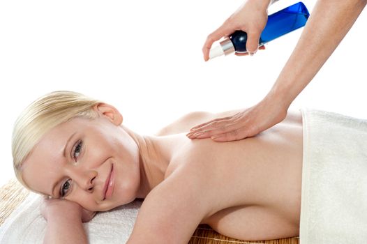 Woman getting extra hydration procedure before skin cleaning at beauty salon