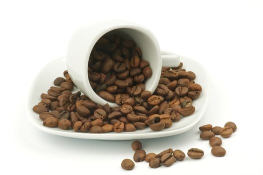 Coffee mug with coffee beans isolated on white backgrounds