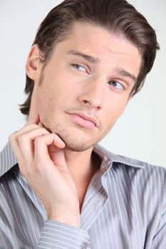 handsome guy puzzled