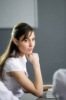 Brunette in business meeting