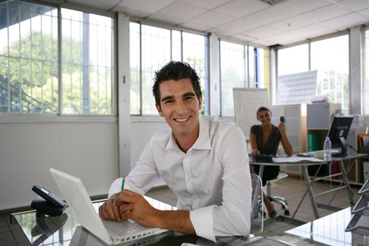 businessman working at his desk