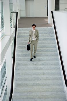 Man walking down stairs