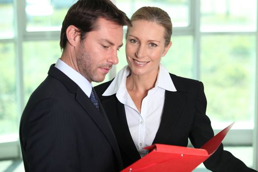 Businessman looking at paperwork.