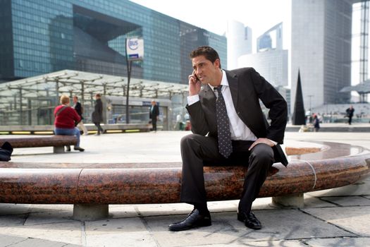 Businessman on a call in the city