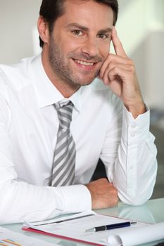 Businessman sat at desk