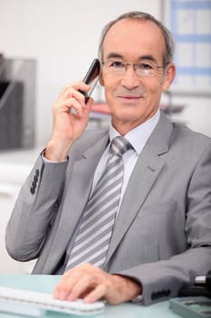 Senior executive on the phone