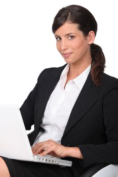 Brunette woman with computer