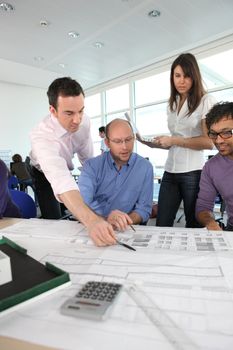 Four colleagues having meeting