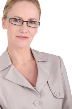 Closeup of a blonde woman wearing glasses
